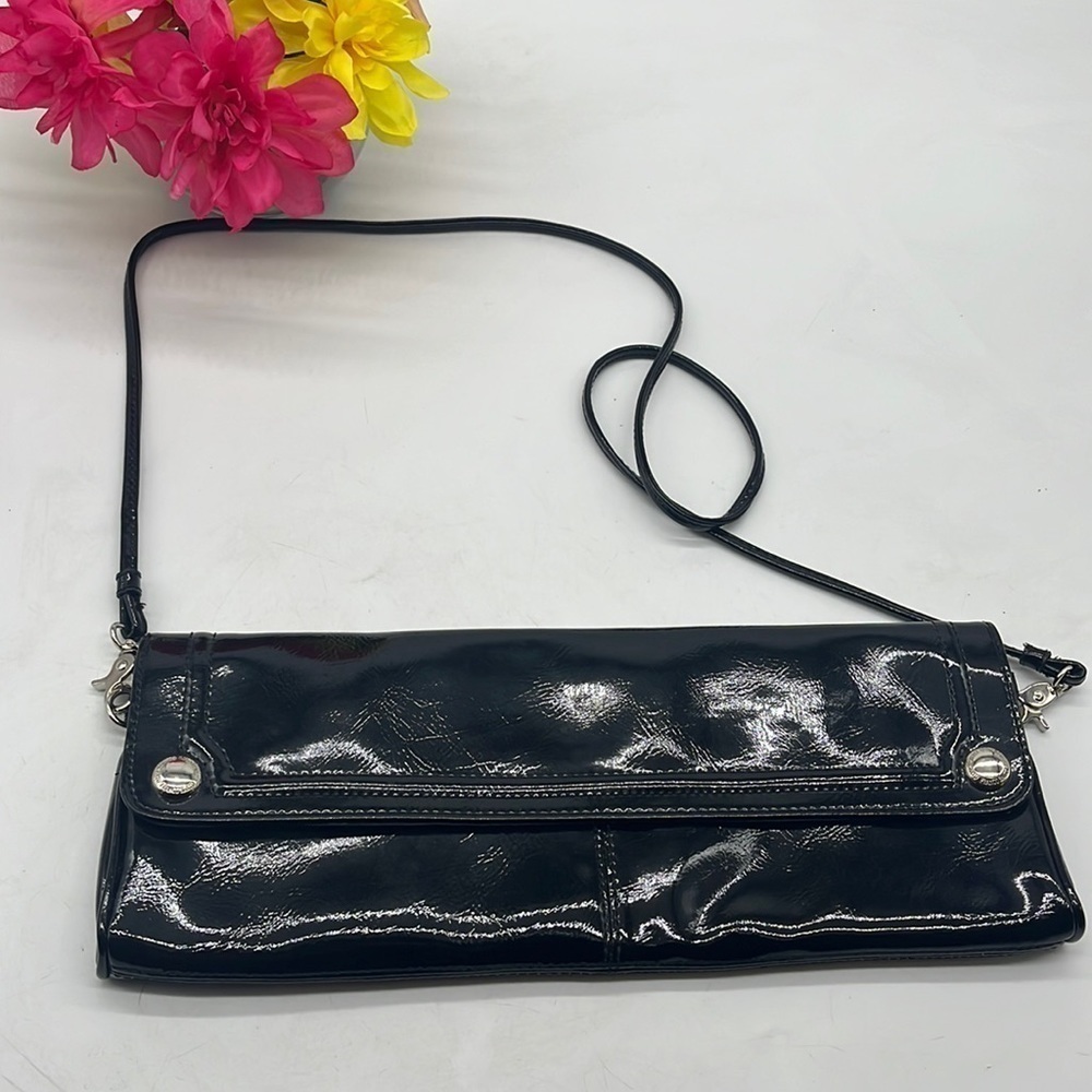 Franco Sarto Black Patent Ling Skinny East west clutch with strap. BP4523B